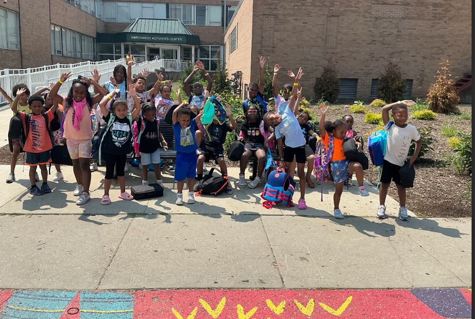 Camp Ignite campers cheering outside