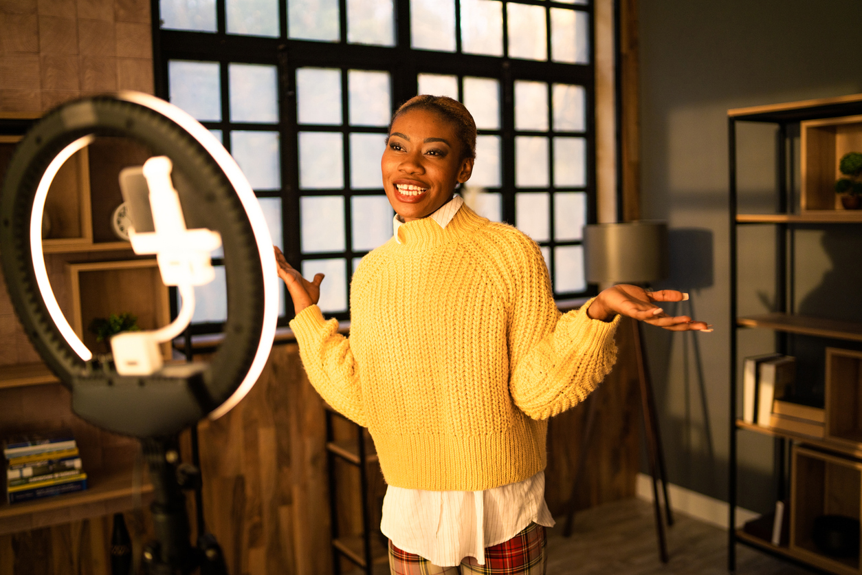 Young entrepreneur recording a pitch to camera